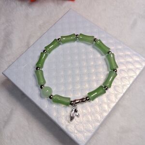 Green Beaded Bracelet with Silver Accents And Leaf Charm